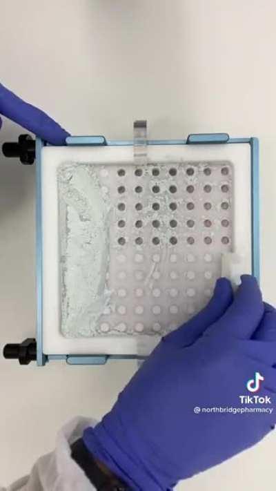 So many specialized pharmacy tools in one video, such as a tapper to condense the powder into the capsule