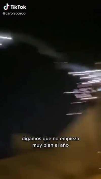 throwing firecrackers to another balcony