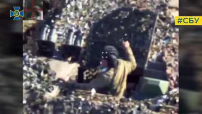 Switchblade 600 direct hit on crew member in open hatch of moving T-90M, tank detonates