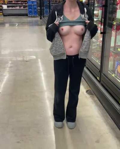 Flashing in Walmart to show off my milf tits