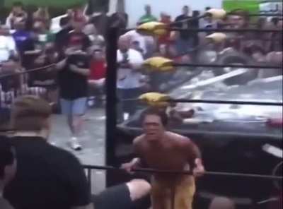 pro-wrestling spot goes further than expected: Man drops a bucket of lime on the (numerous) open wounds of opponent