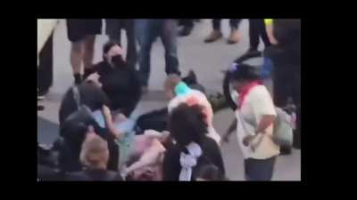 Intersection of 5th Street and Hill Avenue, Los Angeles, California Date & Time: June 15, 2025, at approximately 7:30 p.m. Summary: Video footage captures an incident at the intersection of 5th and Hill in which a protester was struck by a red Toyota 