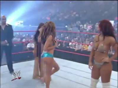 20 years ago, Torrie, Victoria, Maria and Candice compete in a bikini contest on RAW