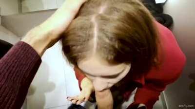 Brunette chick gives POV blowjob in changing room and swallows cum