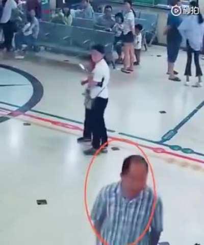 Man holding knife in hospital was subdued by old man