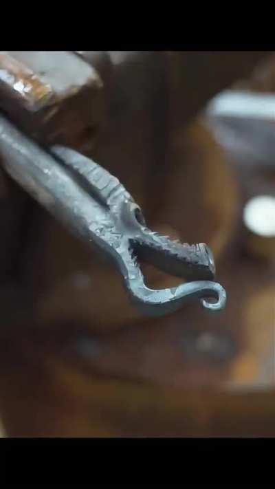 Smithing an iron dragon head