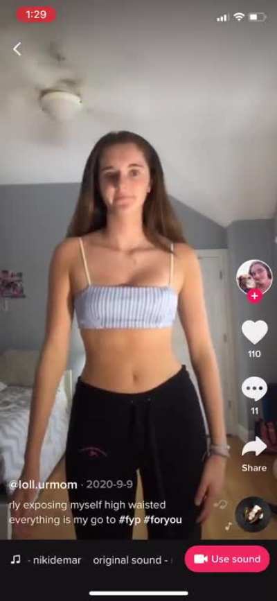 Cute girl showing off belly and hips