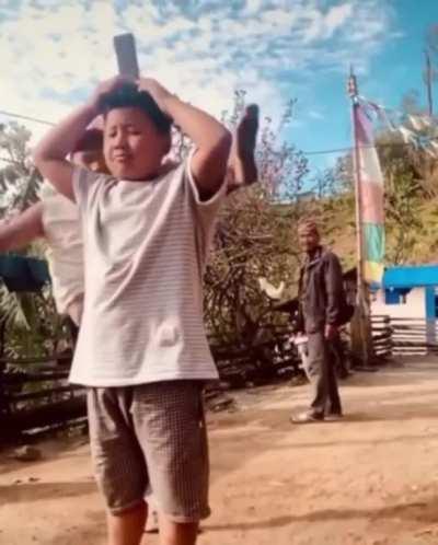 To spin kick board off son's head