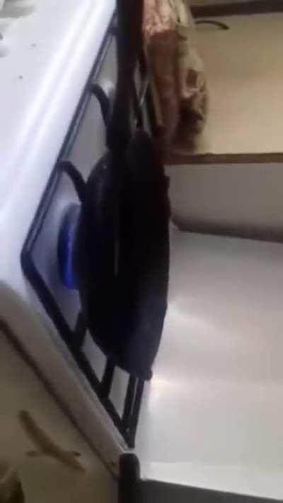 This one's in Russian, but this kid tries to see what happens if you pour water onto a frying pan with oil inside of it