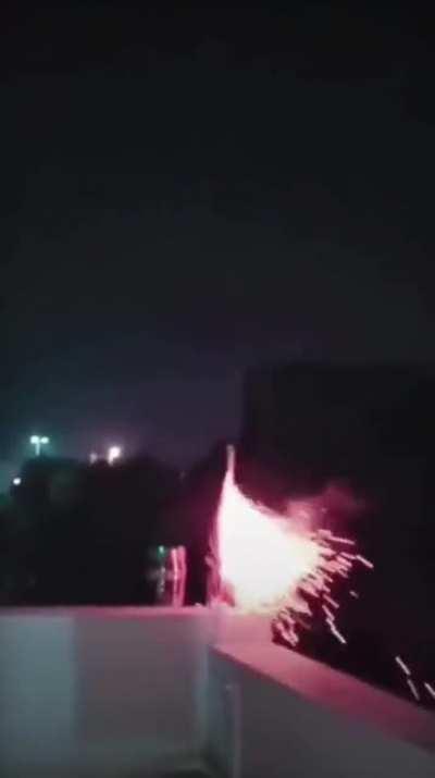 Guy sets off firework that lands in someone’s window.