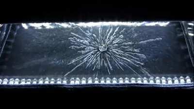 Put some Uranium-238 in a cloud chamber to see radioactive particles
