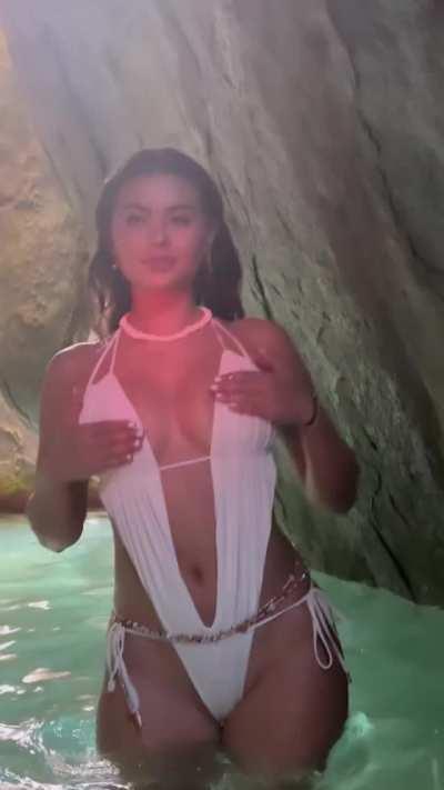 Sofia in white swimsuit