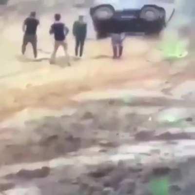 Trying to flip a car upright.