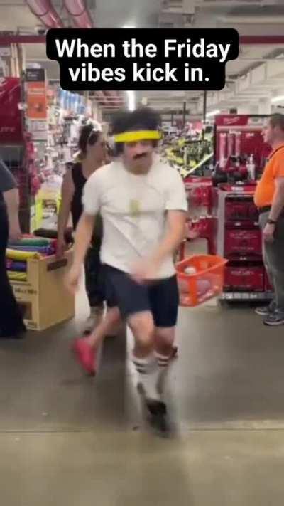 guy dancing in a supermarket while people are doing their shopping