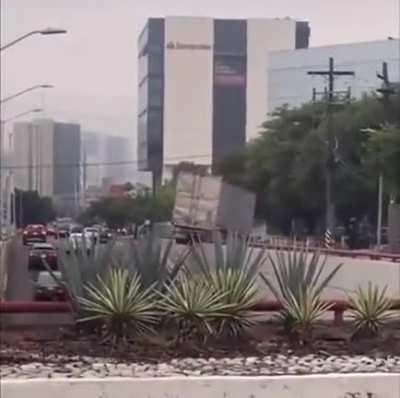 Truck does an backslide rockslide