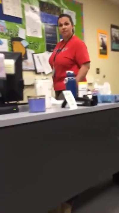 Student grabs teachers leg from under desk