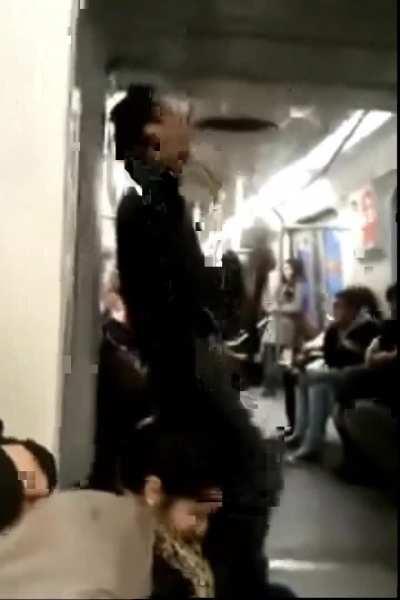 Crazy guitarist on subway train