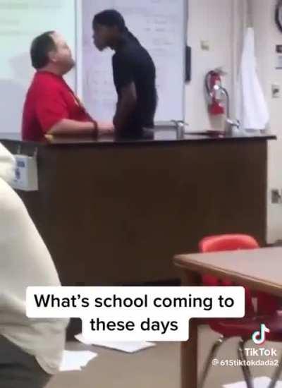 Student grabs teacher's throat