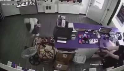 Store owner takes down robber