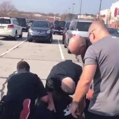 Policemen assault and choke a man because they thought he was holding a gun.Turns out it was just his cellphone.