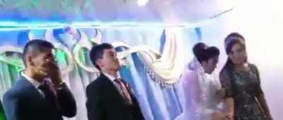 Man smacks bride during wedding