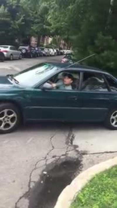 Crazy Greek man almost runs over pedestrian and argues with him