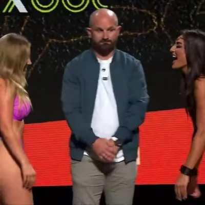 Rare kiss during a face off. Amber O’Donnell and Whitney Johns.