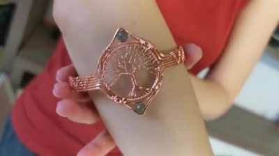 A tree of life armband I made with copper wire.