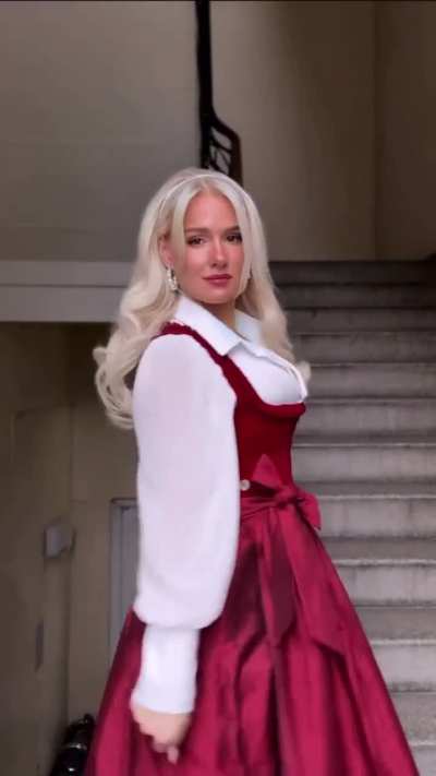 German blonde in red dirndl