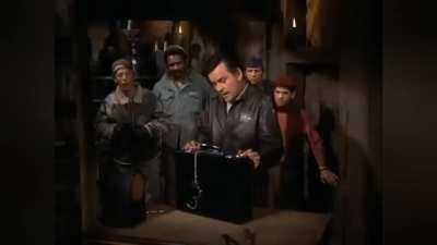 Hogan opens a briefcase, but it's an accident of war