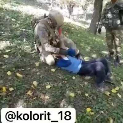 Azerbaijani soldiers cut off the head of an Armenian old man