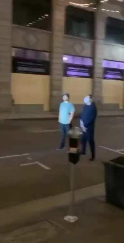 2 guys shots for standing in the street