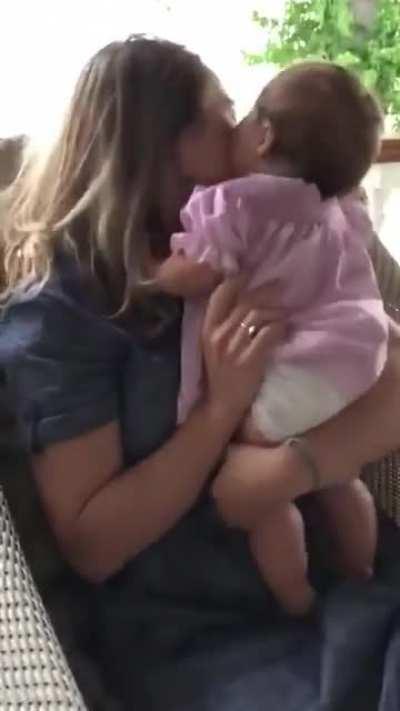Baby's rabidly kiss attack