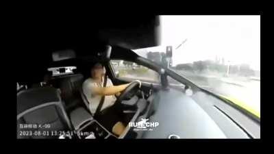 China. Driver of speeding car injured, author no injuries.