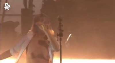 Phoebe Bridgers at flashing on stage at Pukkelpop