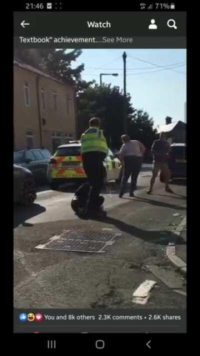 Guy tries to fight cop.