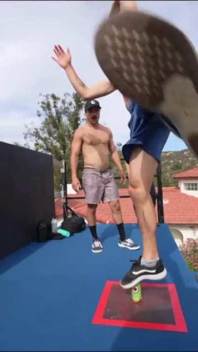 Man manages to balance even after getting flung from the trampoline