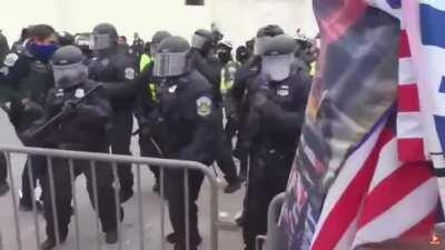 MAGA supporters going at it with the police at Capitol Hill