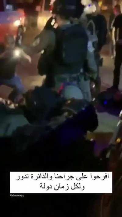 Watch the settlers whom have occupied Mariam Al Ghawi's house two days ago, laughing at an activist being beaten up by zionist occupying soldiers, he stood outside the house protesting the occupation of the house, his pic after the attack in first comment