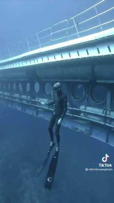 Scubaing next to a sub