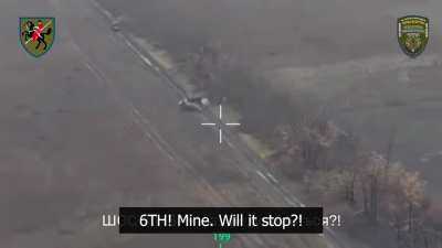 110 OMBr footage of the repulsion of an assault on Noviy Komar, where an assaulting tank hit 6 mines before finally being disabled 12/18/24 (translated to english)