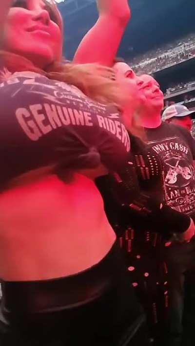 Dancing at a rockbands live concert