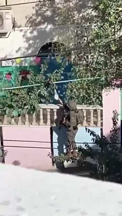 Israeli occupation forces remove Palestinian flags from the streets while storming the village of Urif, south of Nablus