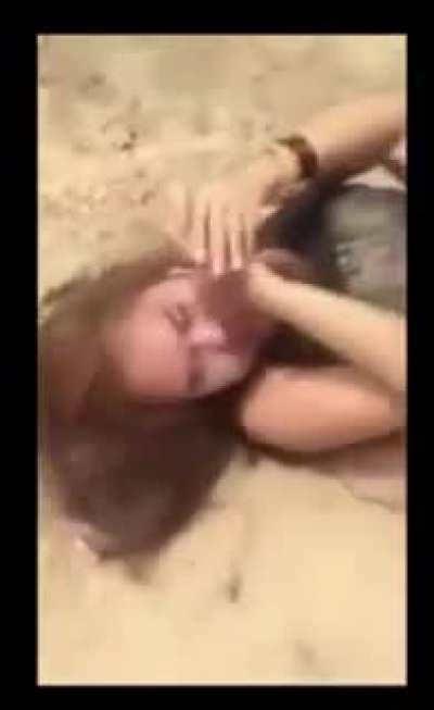 beaten and humiliated as her face is smothered by one of the assailants feet