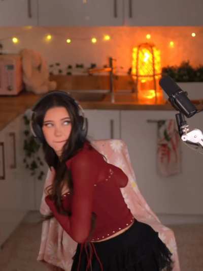 LydiaViolet punches in her maroon outfit