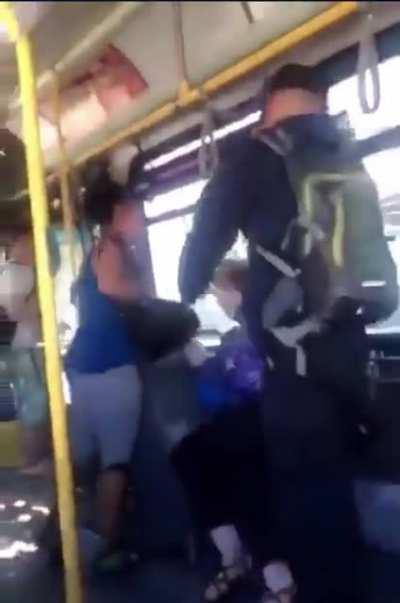 Elderly woman gets punched for spitting at her