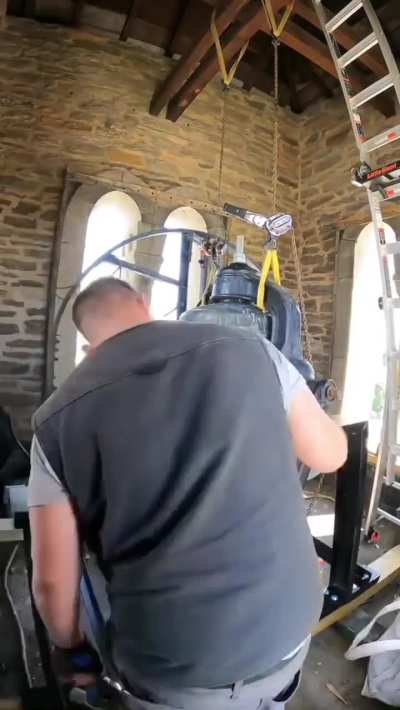 Assembling and fitting a new frame for an old church bell [OC]