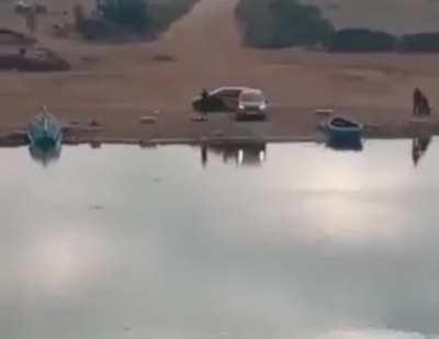 Trying to make donuts on a 90hp front-wheel drive car near a river.