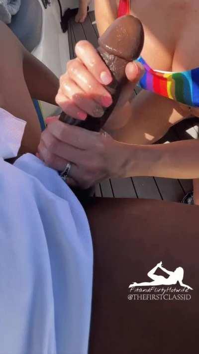 Getting that dick hard on the boat in front of her hubby 😈🤤🔥