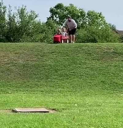 To let the kids ride down a hill